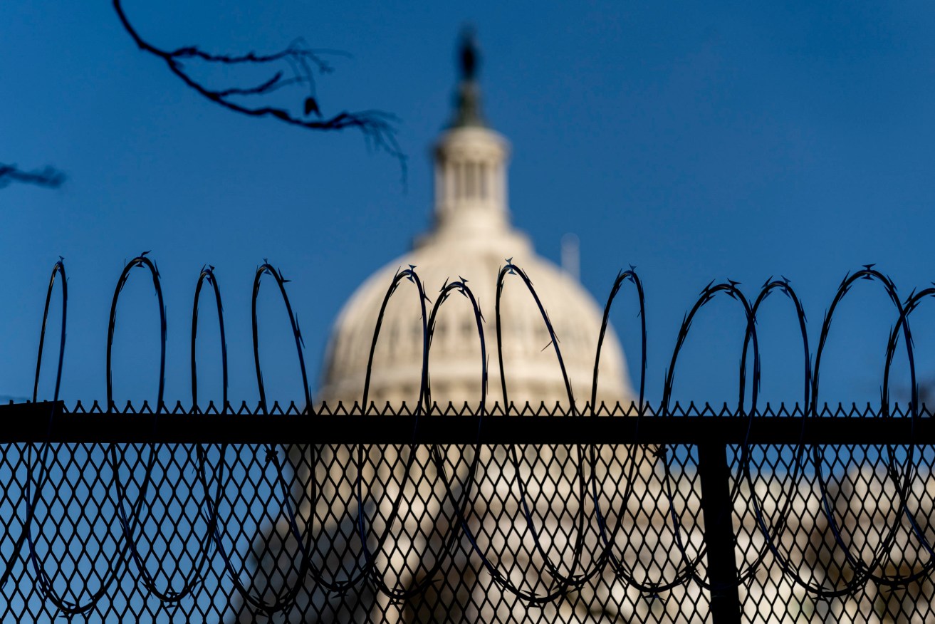 The U.S. Capitol is being been sealed off with fences and razor wire. Photo: AP/Andrew Harnik