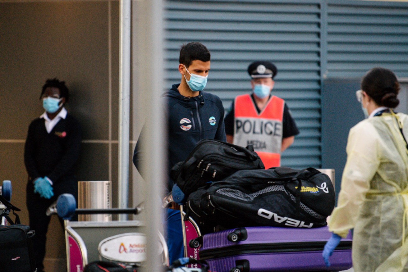 Novak Djokovic arrives at Adelaide Airport last night to quarantine ahead of an exhibition event at memorial Drive on January 29. Picture: Morgan Sette/AAP
