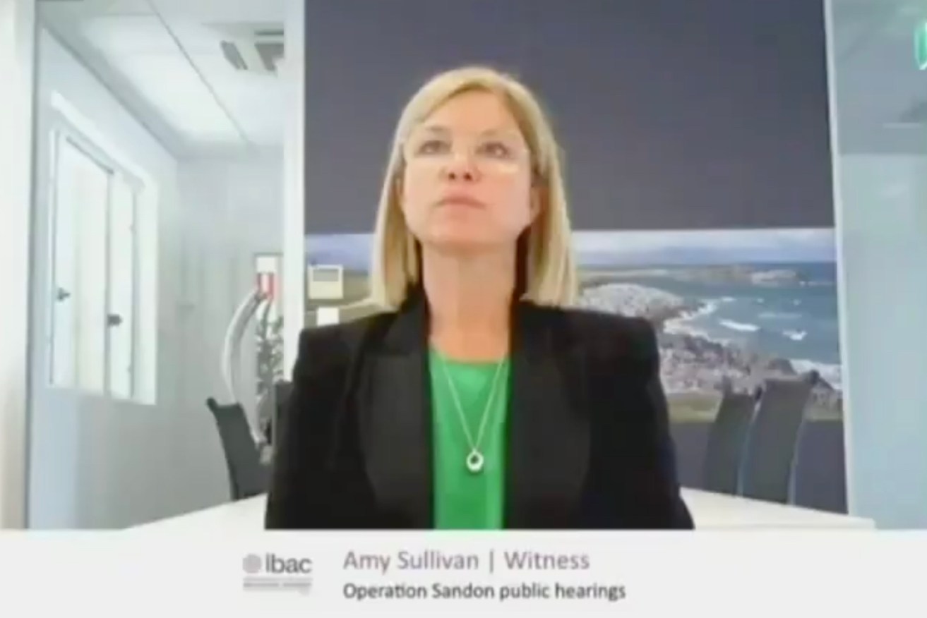 Amy Sullivan appearing at last month's IBAC hearing via video link. Photo: Screenshot of IBAC livestream, via 9 News Melbourne