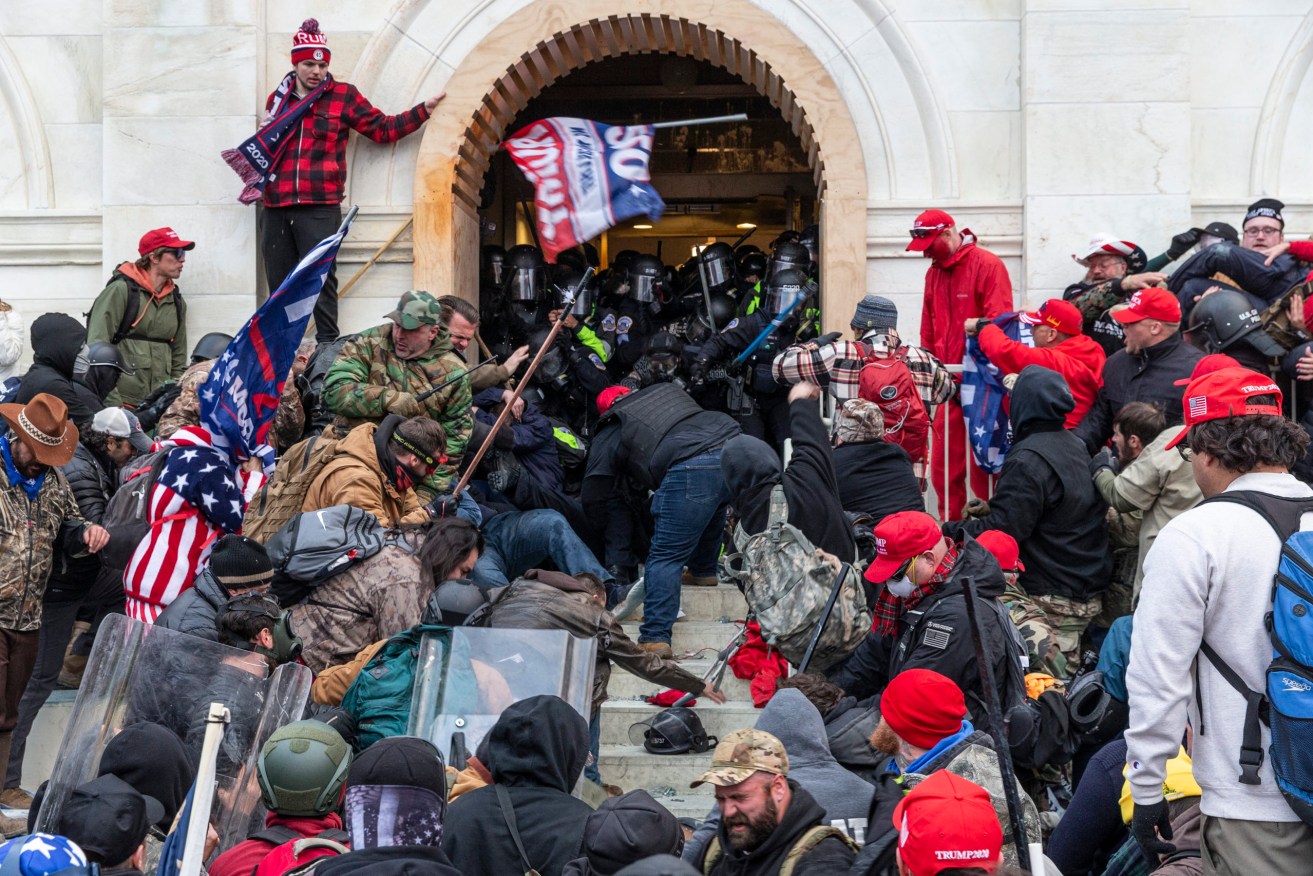 Trump supporters stormed the US Capitol in January 2021 as Congress met to ratify the election result. Photo: Lev Radin/Sipa USA