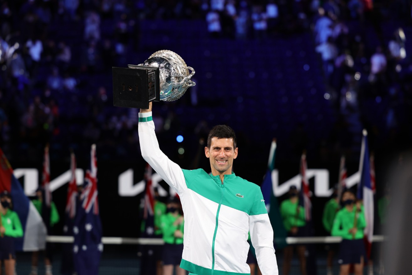Novak Djokovic celebrates after beating fourth seed Daniil Medvedev in the Men's Final at the 2021 Australian Open. Picture: Sydney Low/CSM/Sipa USA