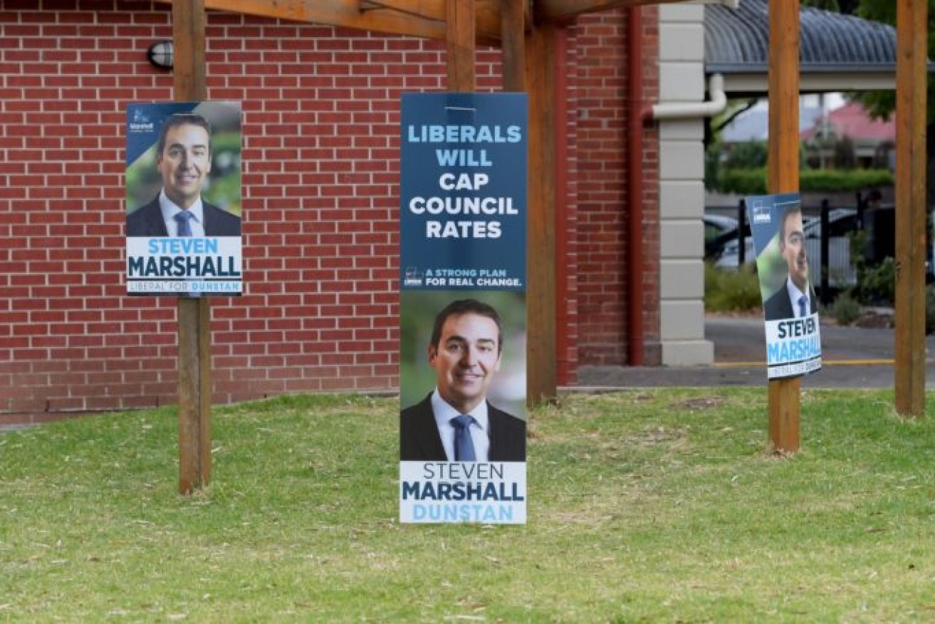 Steve Marshall campaign posters on election day, 2018. Photo: Tracey Nearmy / AAP
