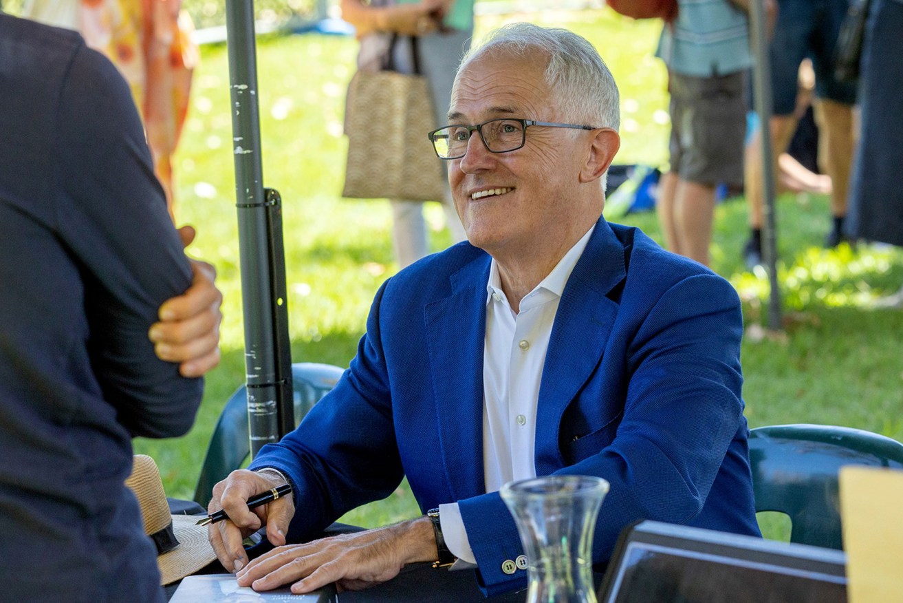 Former Prime Minister Malcolm Turnbull signing books at Writers' Week on Sunday. Photo: Tony Lewis