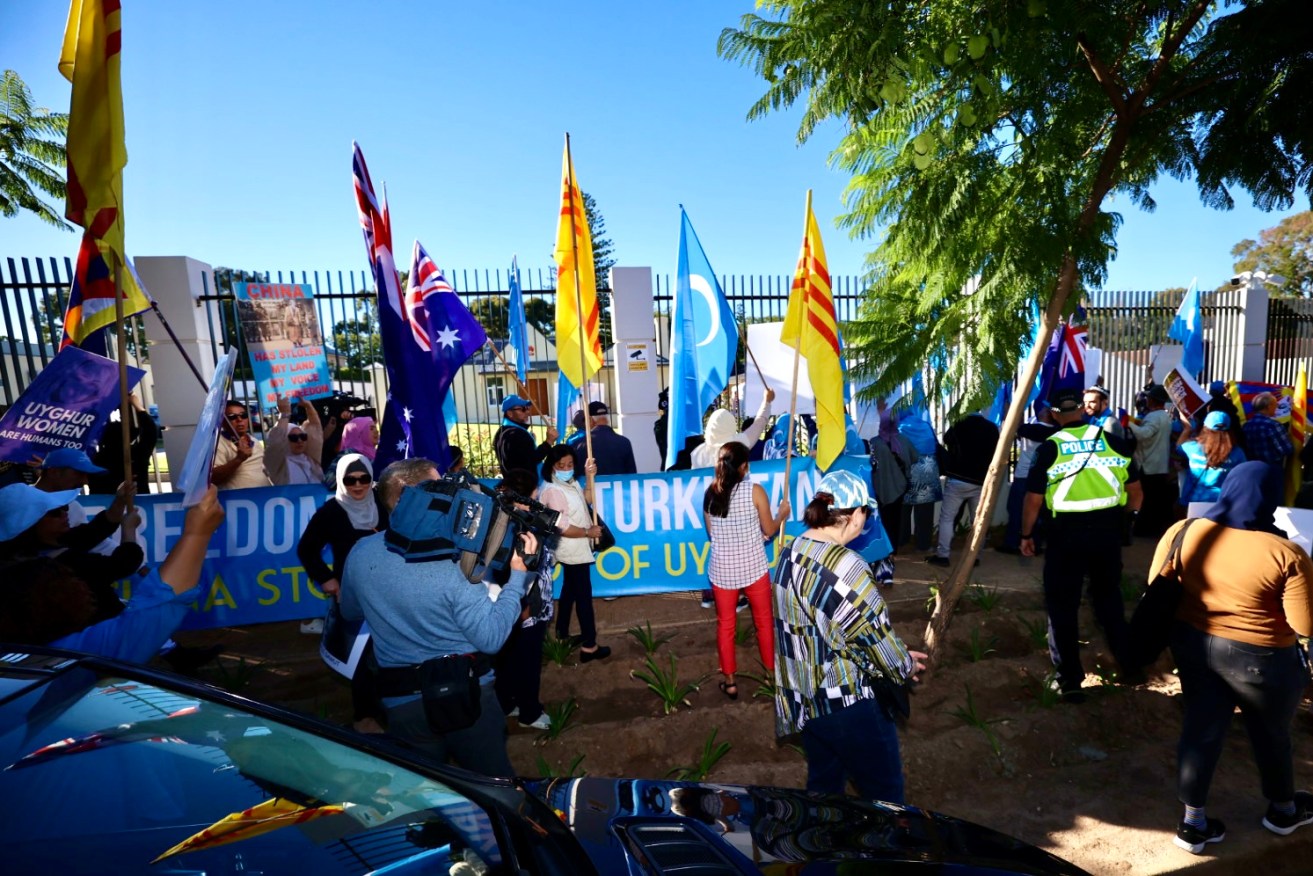 Protesters outside the Chinese Consulate in the Adelaide suburb of Joslin, opened by Premier Steven Marshall on Tuesday, March 30. Photo: Tony Lewis/InDaily