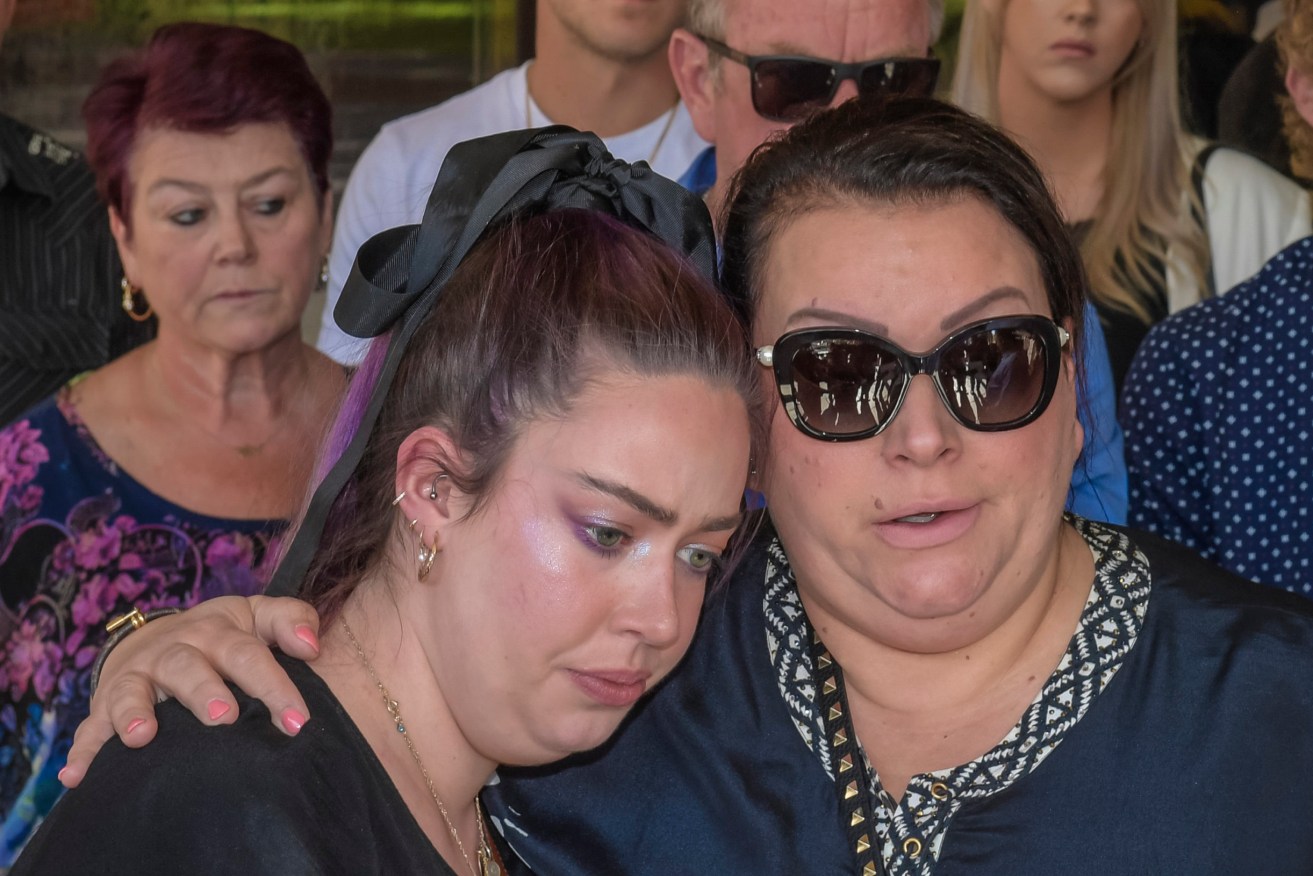 Chelsea Ireland's sister Maddie Ireland (left) and Lukasz Klosowski's mother Magda Pearce outside the Adelaide Supreme Court after South Australian man Pawel Klosowski who shot and killed his son, Lukasz Klosowski, and his son's girlfriend, Chelsea Ireland, was jailed for at least 34 years. (AAP Image/Roy Vandervegt) 