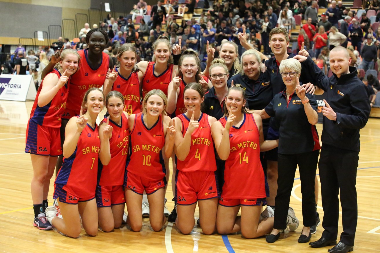 SA Metro Women celebrate their national U18 championship. Photo: Basketball Australia