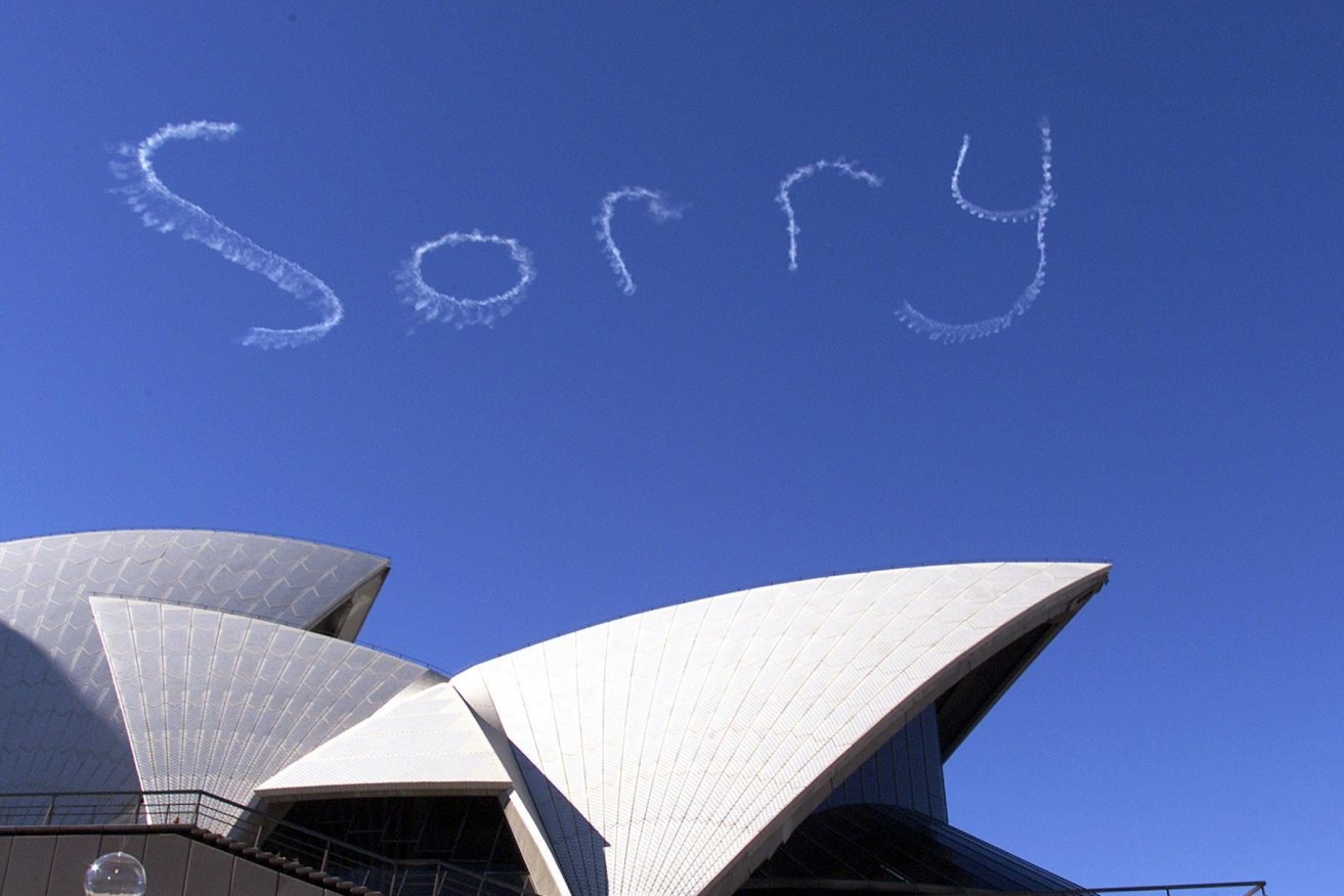 Skywriting above the Sydney Opera House on May 28, 2000 - the day when more than 150,000 people crossed the Sydney Harbour Bridge as a sign of reconciliation. Photo: AP/Rob Griffith