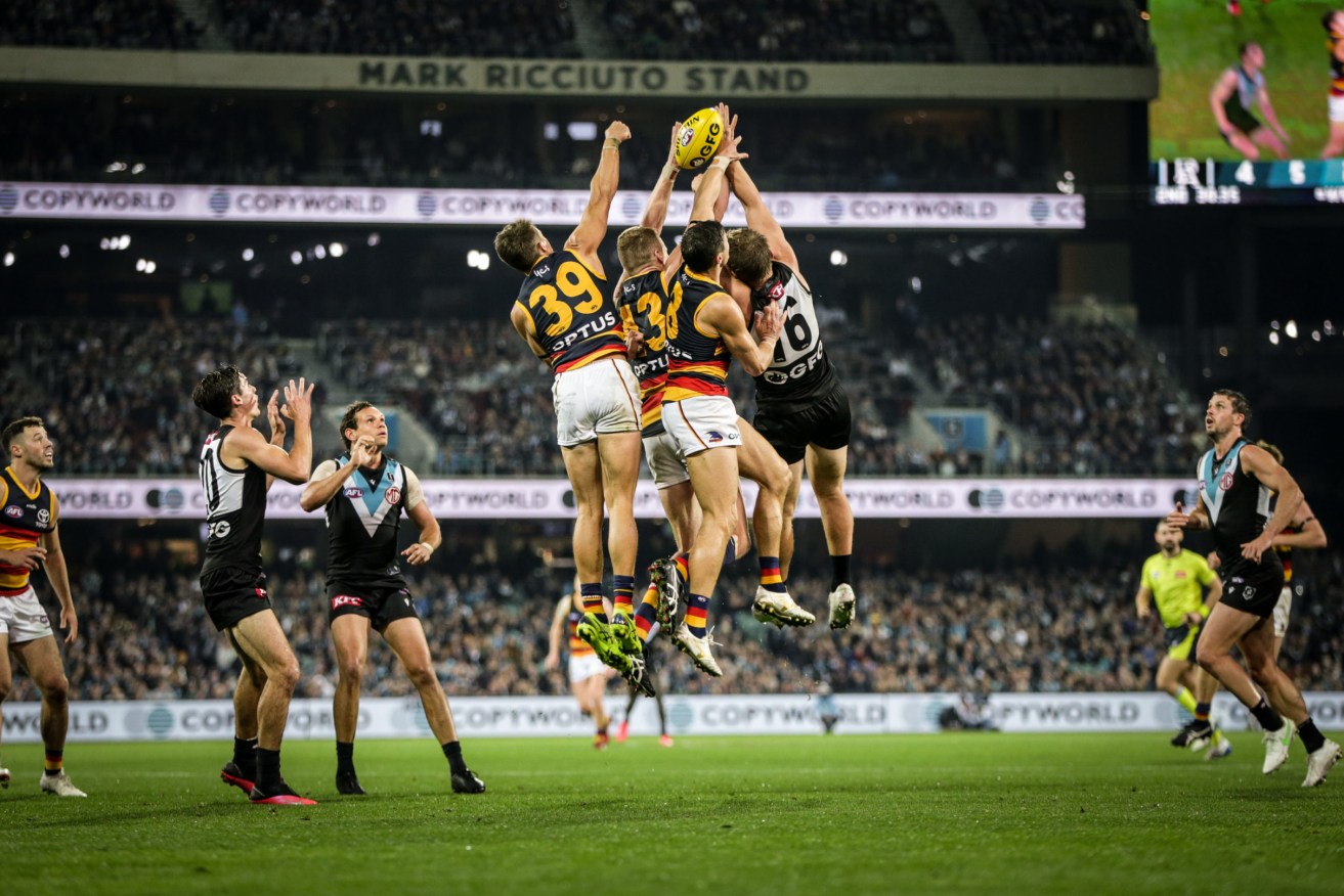 Port Adelaide and Adelaide in the May Showdown. Photo: AAP/Matt Turner