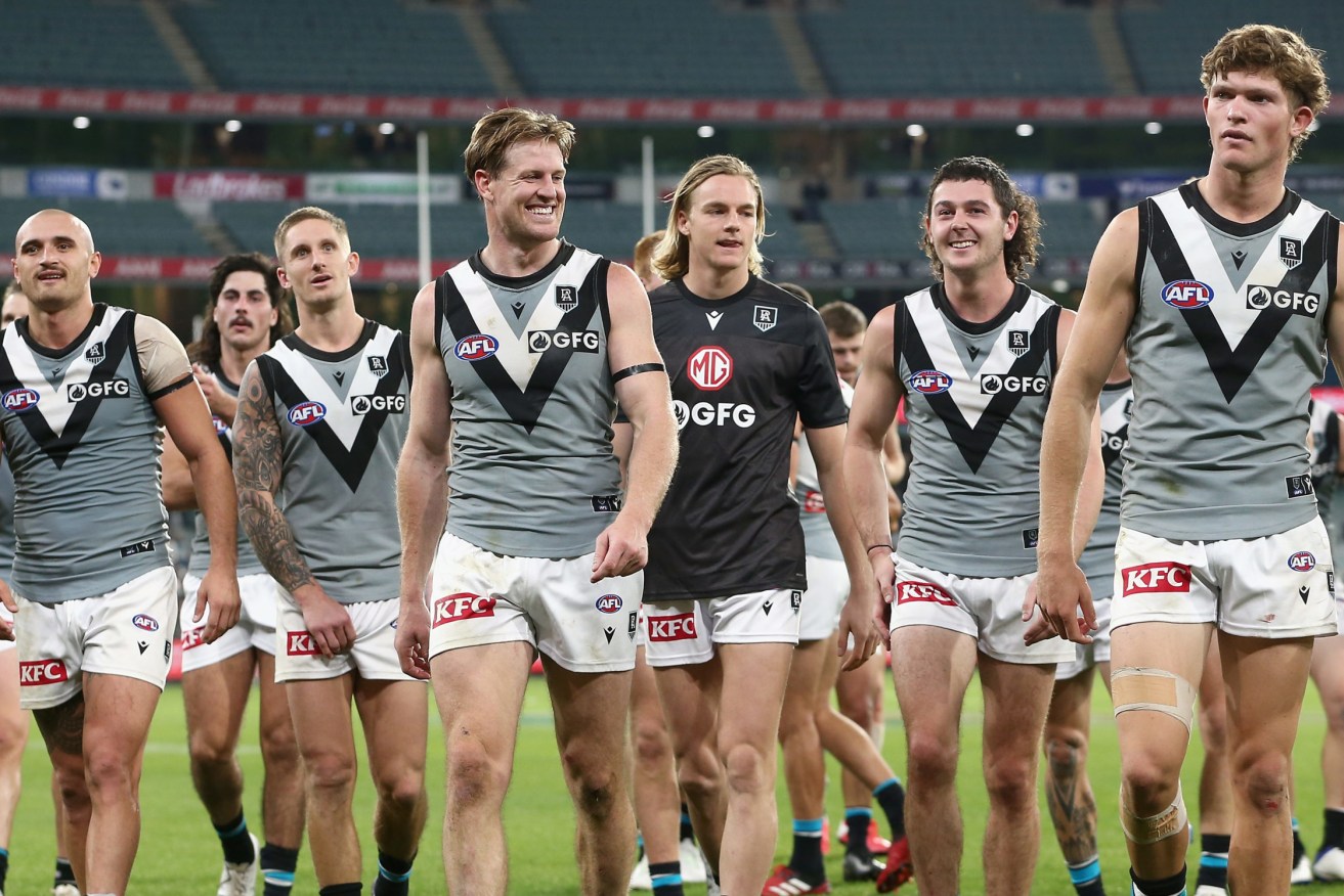 Port Adelaide players walk off during the Round 10 AFL match between the Collingwood Magpies and Port Adelaide Power at the MCG in Melbourne, Sunday(AAP Image/Rob Prezioso) 