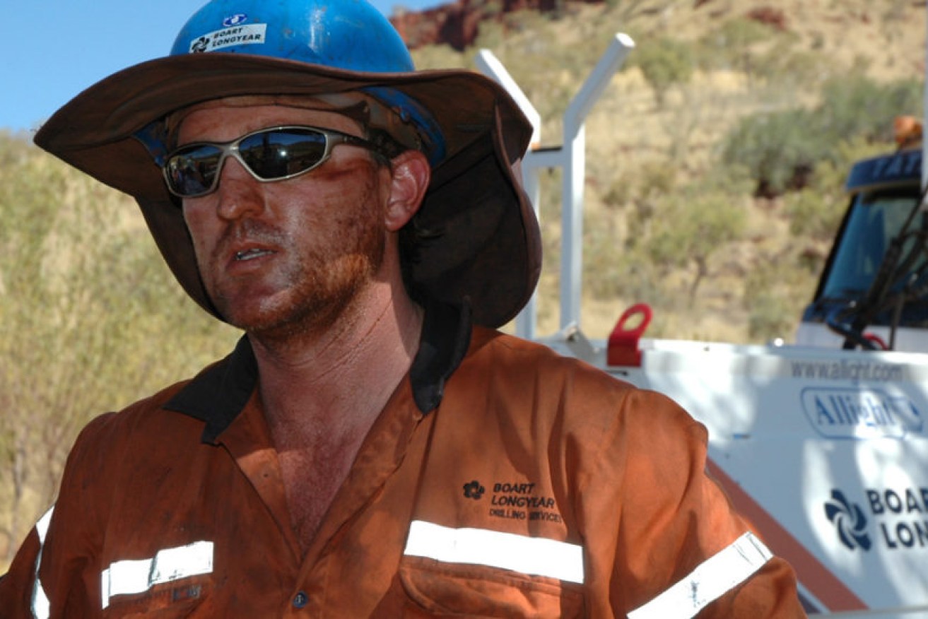 A Boart Longyear driller on the job in the Pilbara.