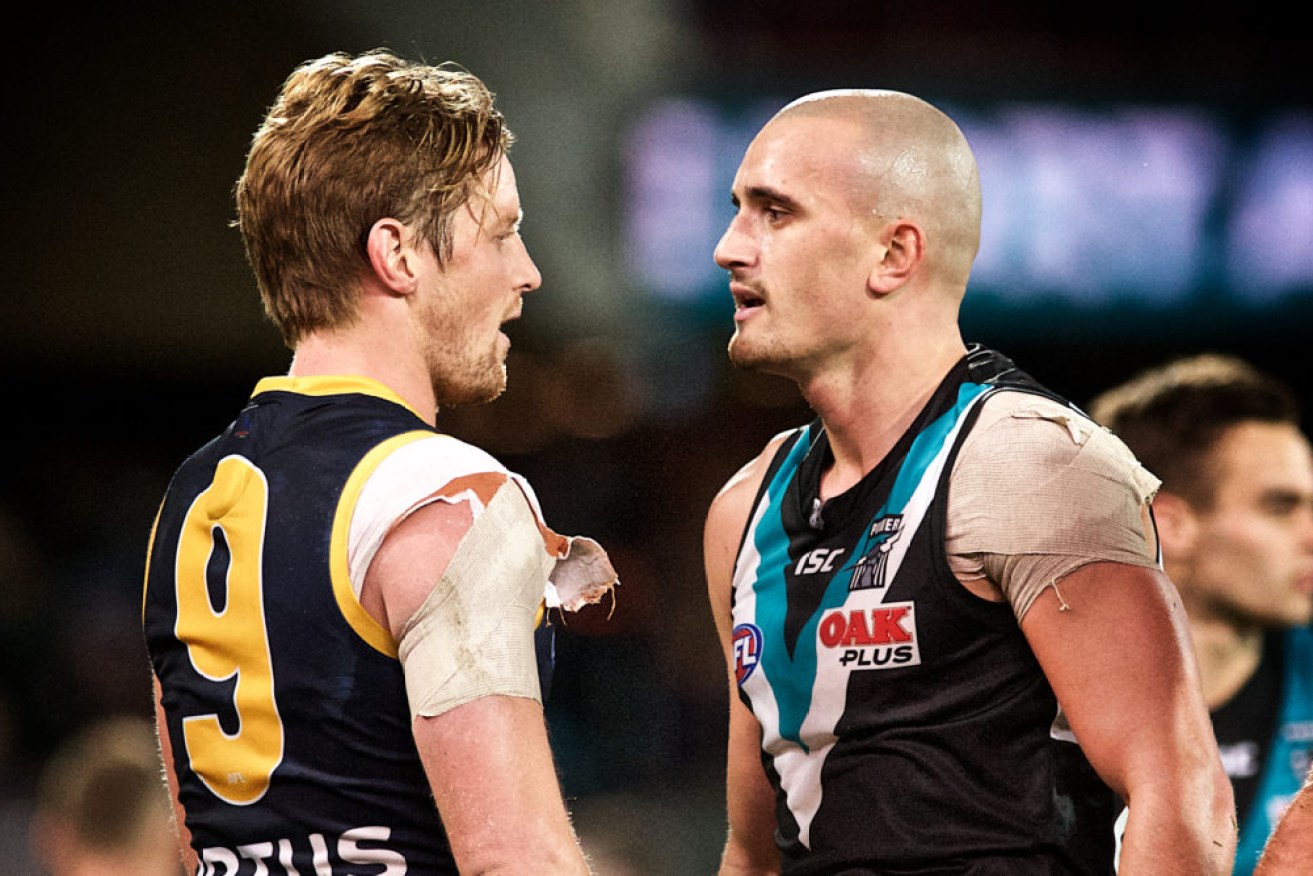 Adelaide's Rory Sloane and Port's Sam Powell-Pepper face off at the 2019 Round 8 Showdown. Photo: Michael Errey/InDaily