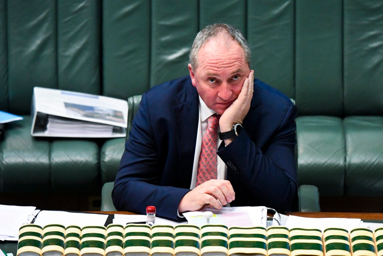 Newly-appointed deputy Prime Minister Barnaby Joyce sits in Parliament while PM Scott Morrison isolates at home. Photo: AAP/Lukas Coch