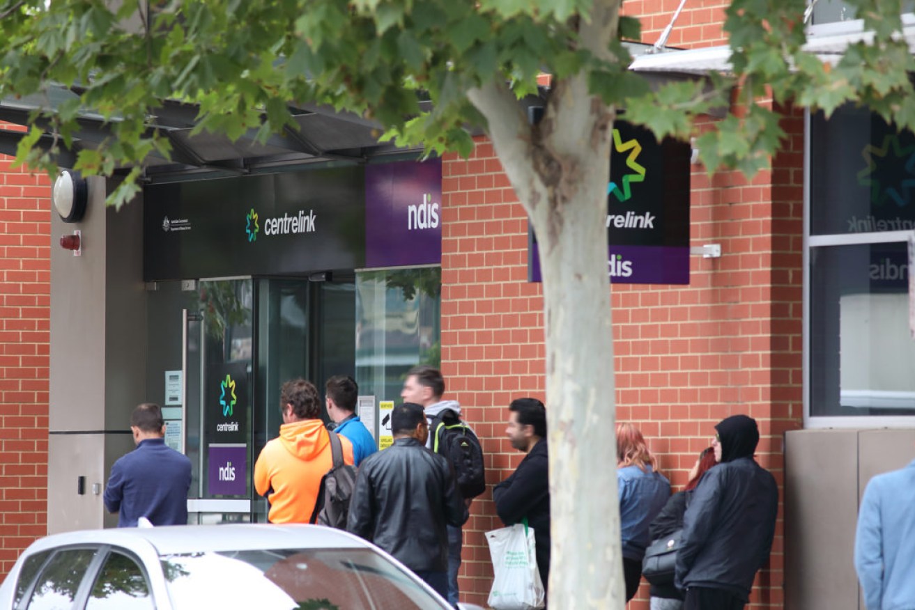 Dozens of people queued outside Norwood's Centrelink office when the pandemic began. Picture: Tony Lewis