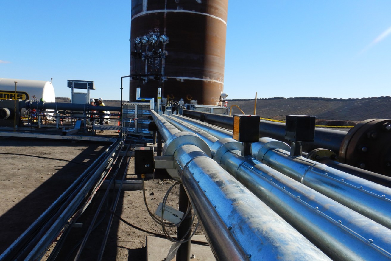 The thermal oxidiser, gathering pipes and fuel tank at Leigh Creek Energy's test site 550km north of Adelaide.