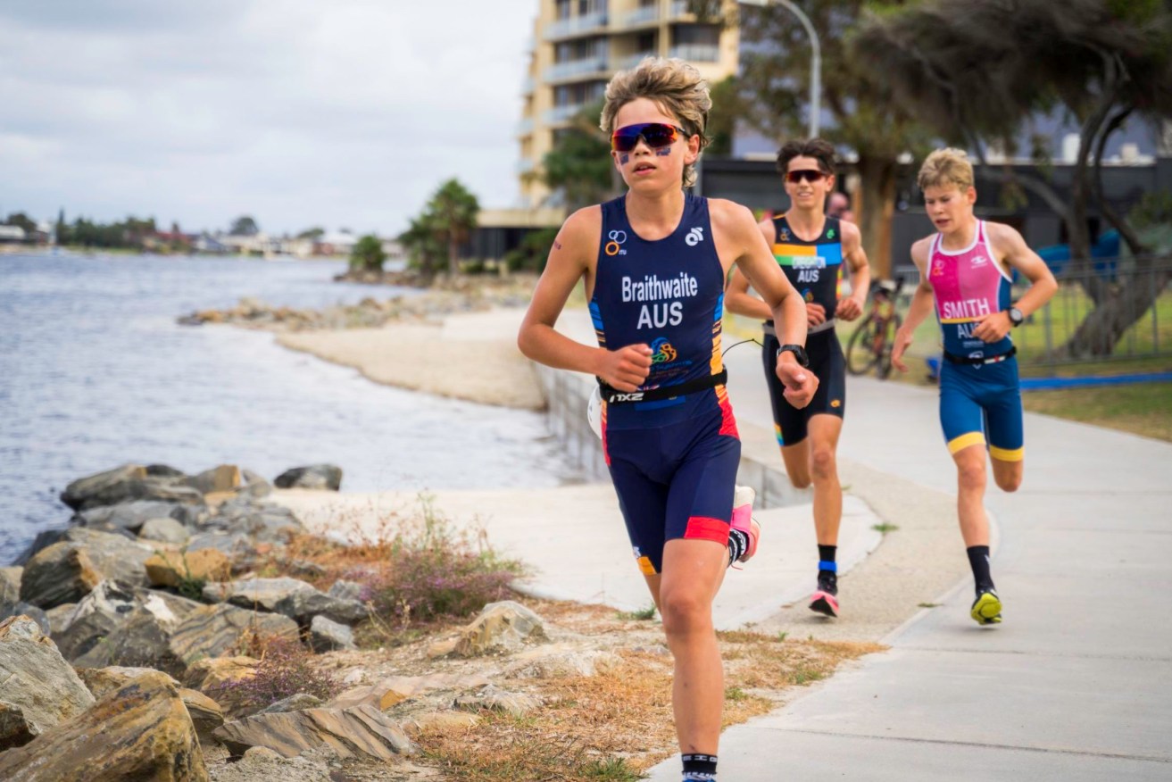 Triathlon SA juniors in competition this year: the organisation says grant changes will force it to close its office within weeks. Photo: Supplied
