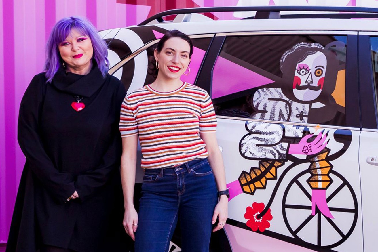 Adelaide Fringe CEO and artistic director Heather Croall with Polina Tsymbal, whose design (pictured) won the 2021 poster competition. Photo: Rebekah Ryan
