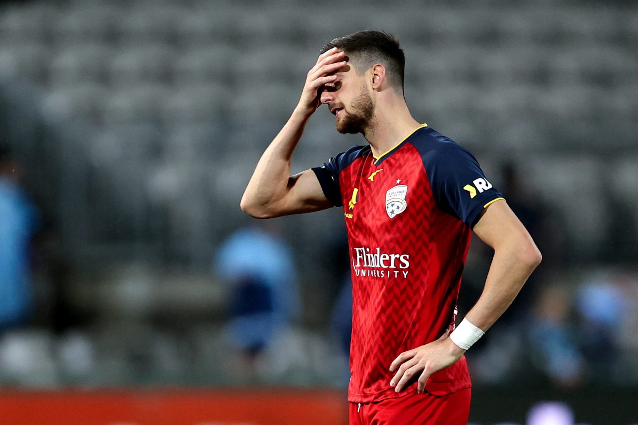 United's Tom Juric after the semi-final loss against Sydney FC. Photo: AAP/Brendon Thorne