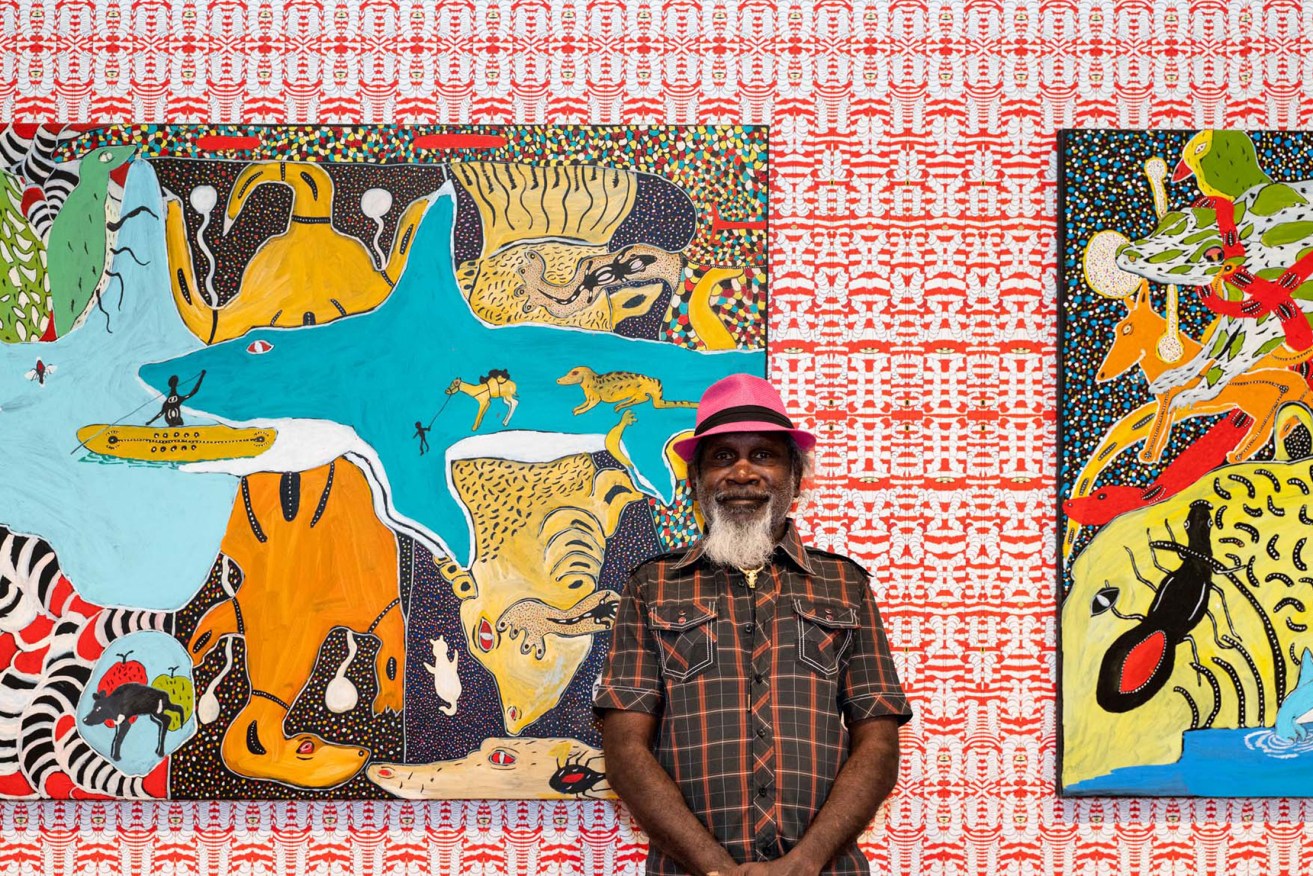 John (Prince) Siddon with his work at Fremantle Arts Centre, Fremantle, WA, 2020; image courtesy the artist and Mangkaja Arts Resource Agency. Photo: Susie Blatchford, Pixel Poetry