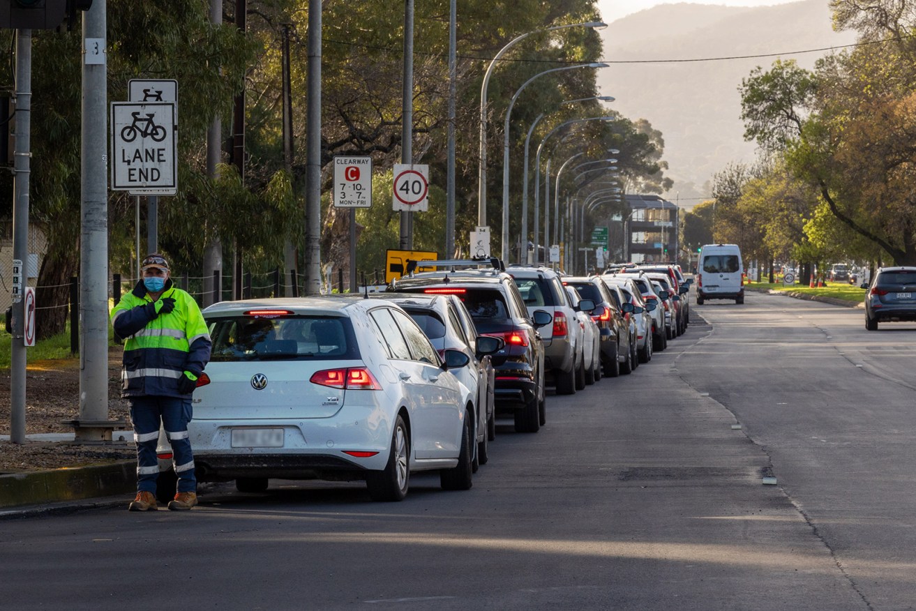 Queue for testing at Victoria Park. Photo: Tony Lewis/InDaily