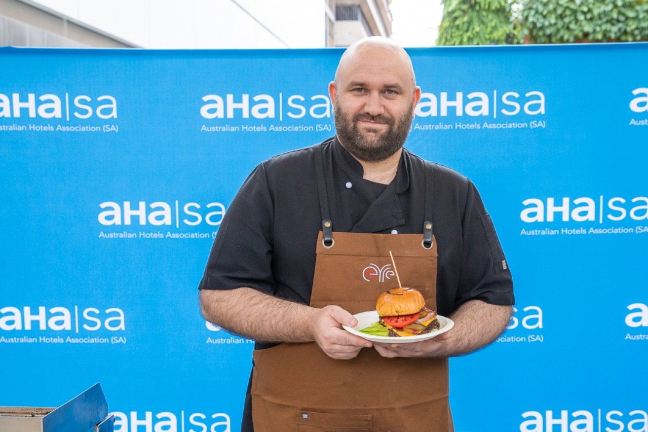 Head Chef Patrick Spriggs from the Eyre Hotel in Whyalla with his winning burger.