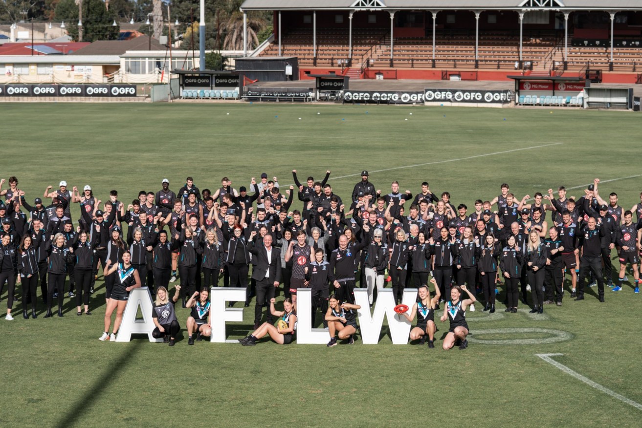 Players and staff celebrate the announcement of Port Adelaide's introduction to the AFLW today. Photo: Matthew Sampson / Port Adelaide FC