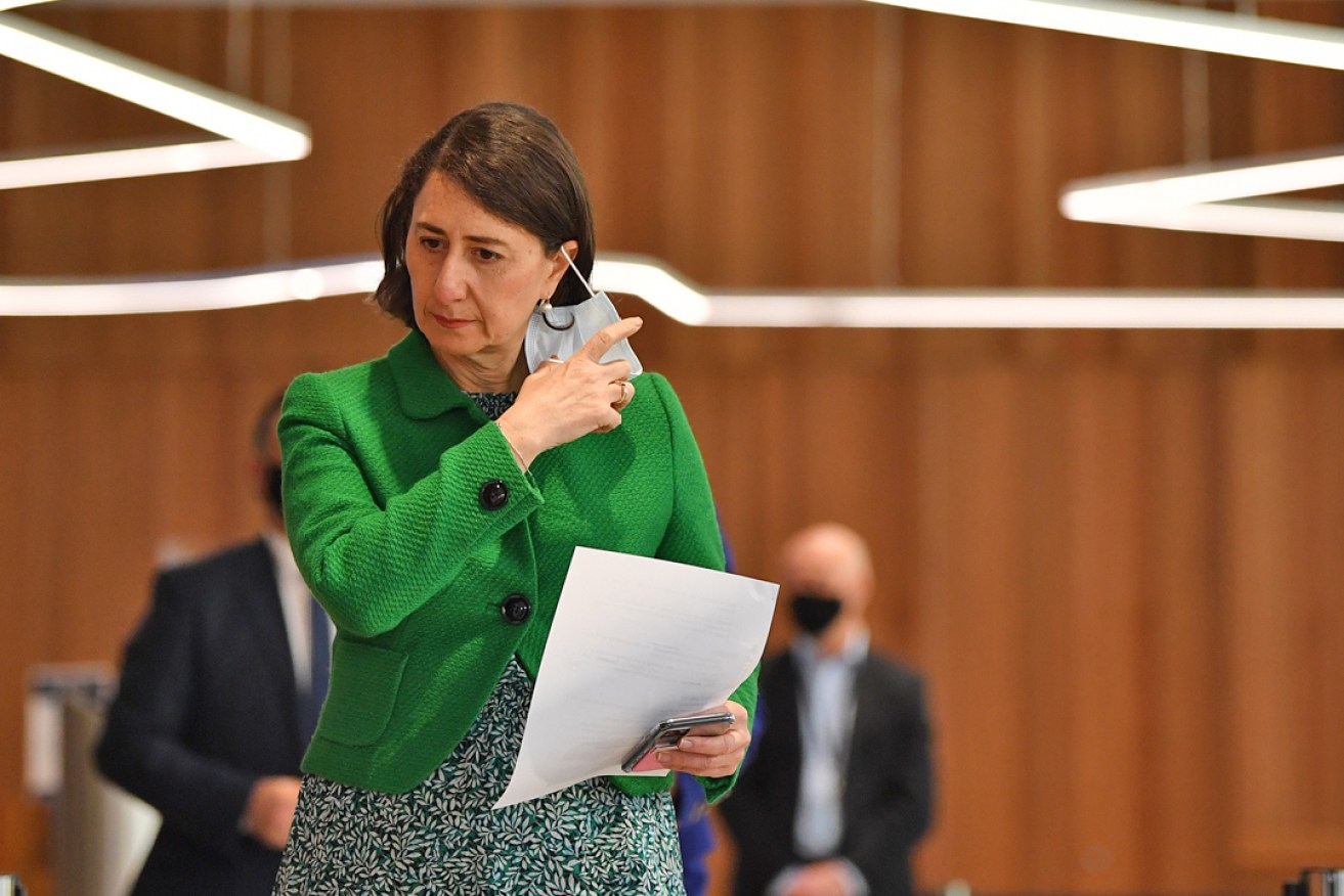 NSW Premier Gladys Berejiklian arrives to speak to the media during a press conference in Sydney, Friday, August 20, 2021. (AAP Image/Joel Carrett)