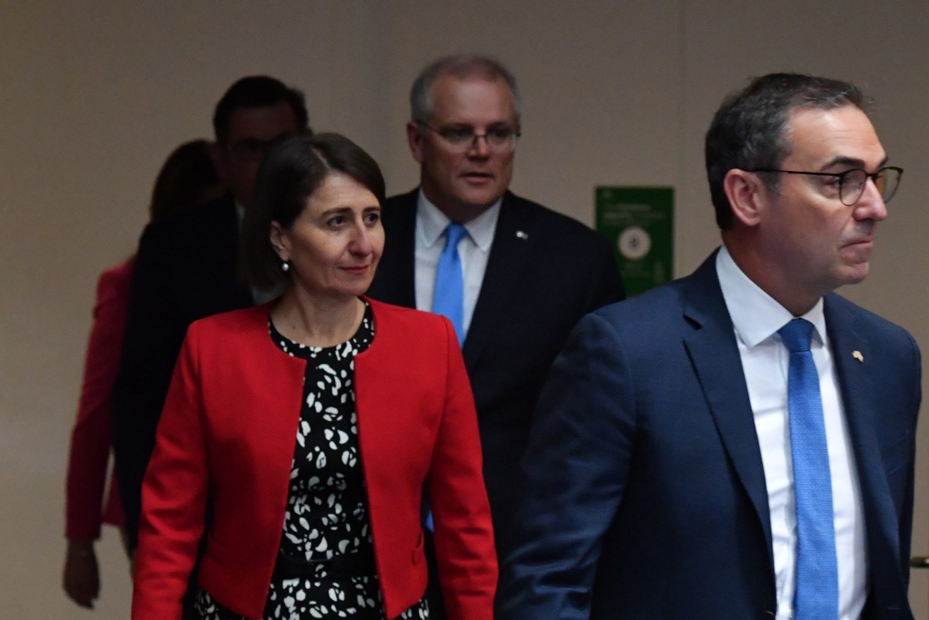Steven Marshall leads Gladys Berejiklian and Scott Morrison into a media conference after national cabinet met last year. Photo: Mick Tsikas / AAP