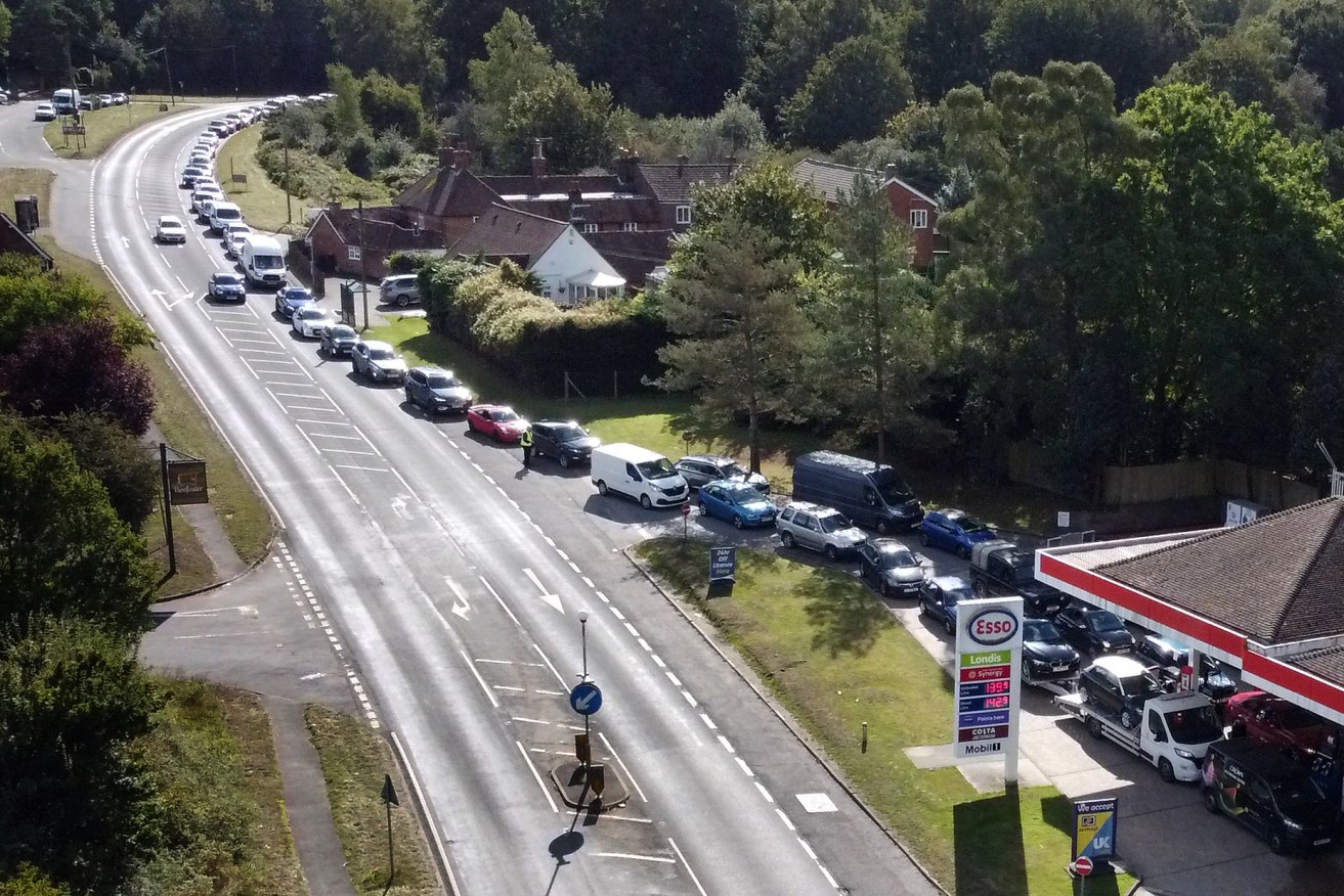 Motorists queue for fuel at a petrol station in Kent. Photo: Gareth Fuller/PA Wire
