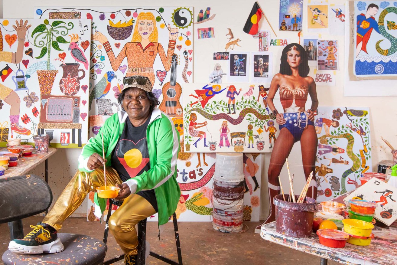 Pop culture meets traditional knowledge: Kaylene Whiskey in the studio at Indulkana, South Australia. Photo: Meg Hansen, image courtesy the artist and Iwantja Arts