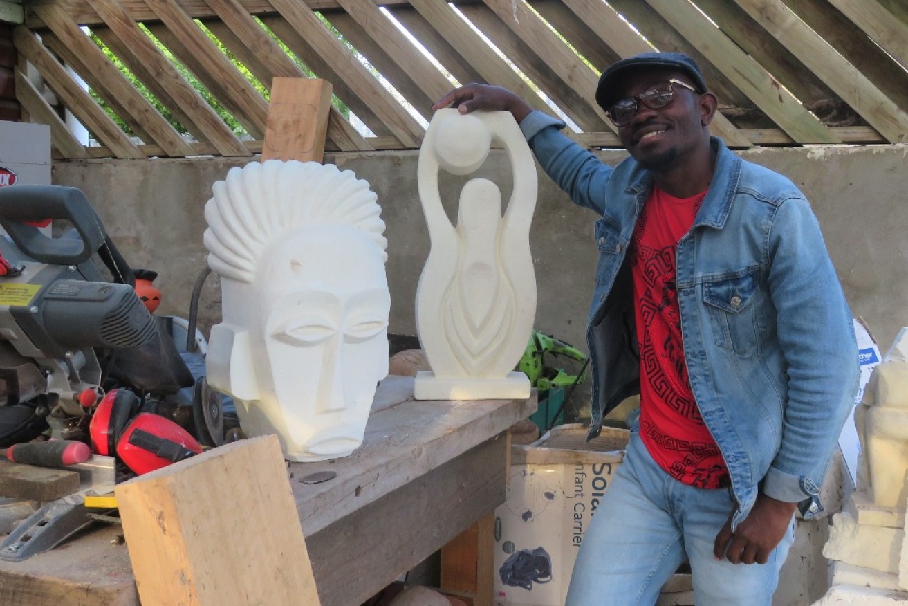 Artist Sadiki Kamundele pictured among his limestone sculptures in his home workspace. He was picked for the UniSA Lifelong Learning Award at the 2021 Regional Showcase Awards. Photo: Gabrielle Duykers.