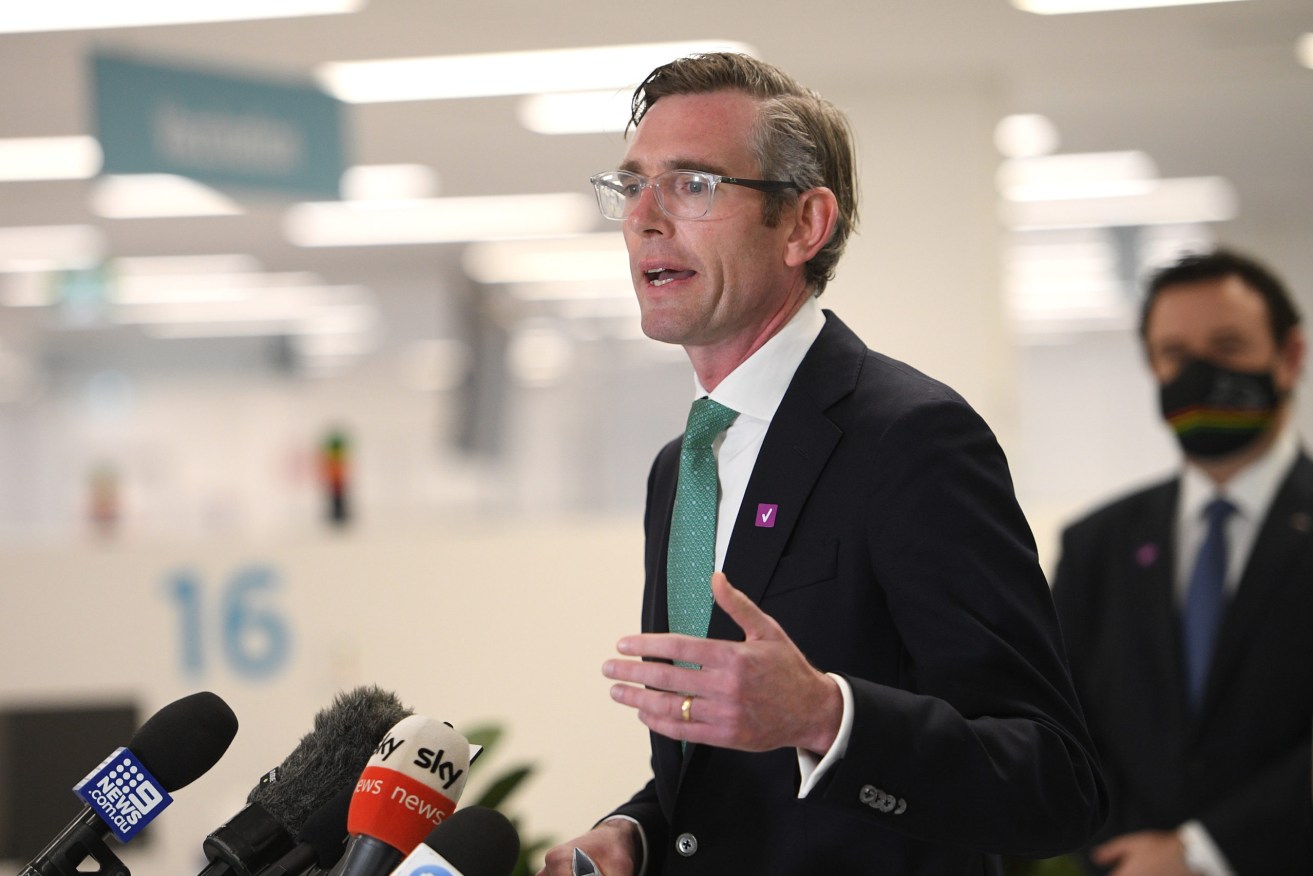 NSW Premier Dominic Perrottet says the state will scrap quarantine for fully-vaccinated travellers from November 1. Photo: AAP/Dan Himbrechts
