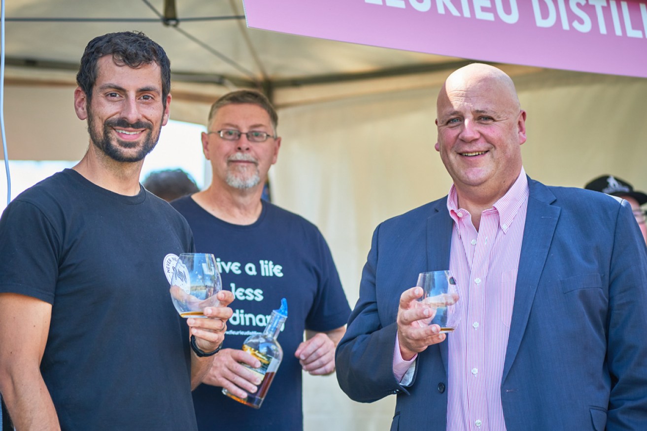 SAPSA president George Georgiadis (left) with Fleurieu Distillery's Gareth Andrews and Primary Industries Minister David Basham at this year's SpiritFest. Picture: Simon Vaughan.