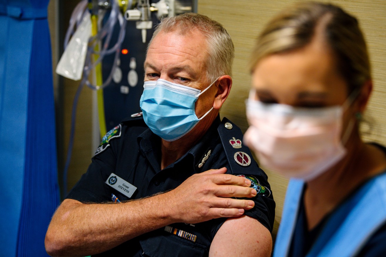 Police Commissioner Grant Stevens getting a Covid-19 vaccination. Photo: AAP/Morgan Sette 