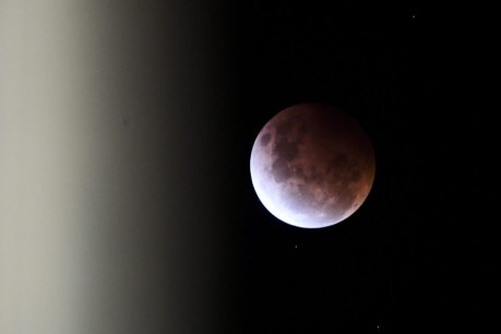 Blood moon rises during partial eclipse tonight