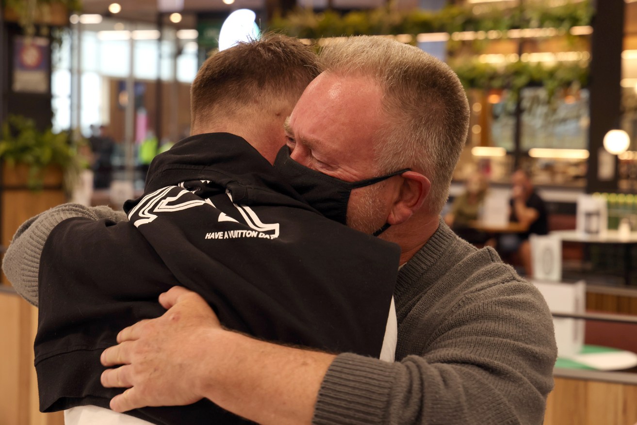 Christopher Leech is reunited with father Steven. Photo: Tony Lewis/InDaily