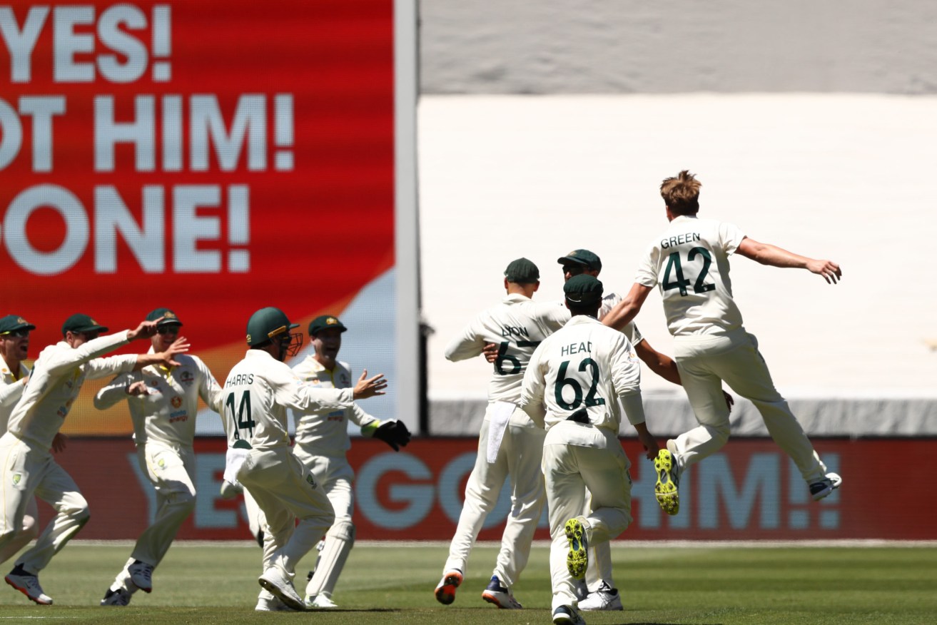 Australia's Cameron Green celebrates the wicket of England's James Anderson to claim The Ashes during day three of the third Ashes test at the Melbourne Cricket Ground. Photo: Jason O'Brien/PA Wire. 