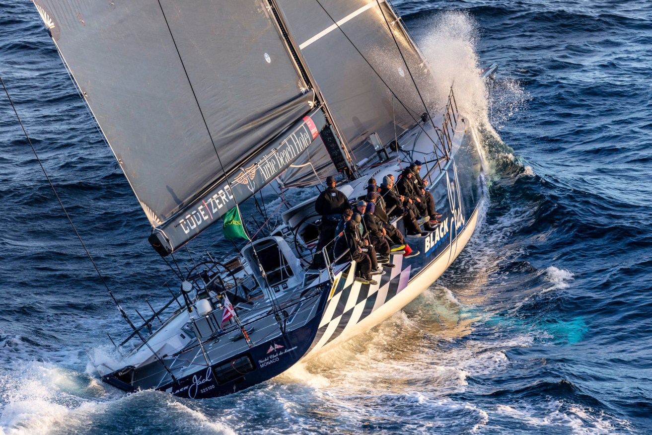 Supermaxi yacht Black Jack has taken line honours in the Sydney to Hobart race. Photo: AAP /Rolex, Andre Francolini