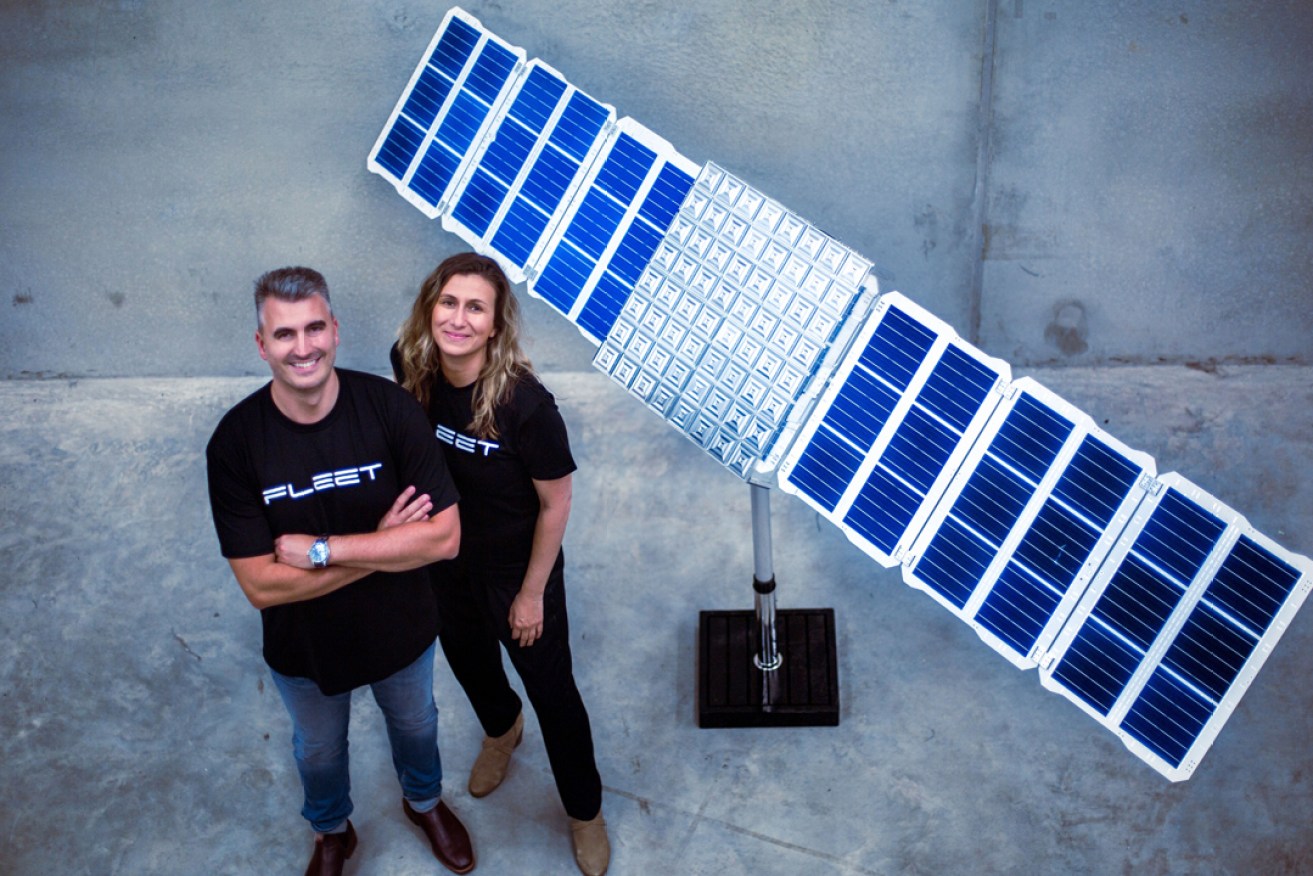 Fleet founders Matt Pearson and Flavia Tata Nardini with an Alpha satellite.