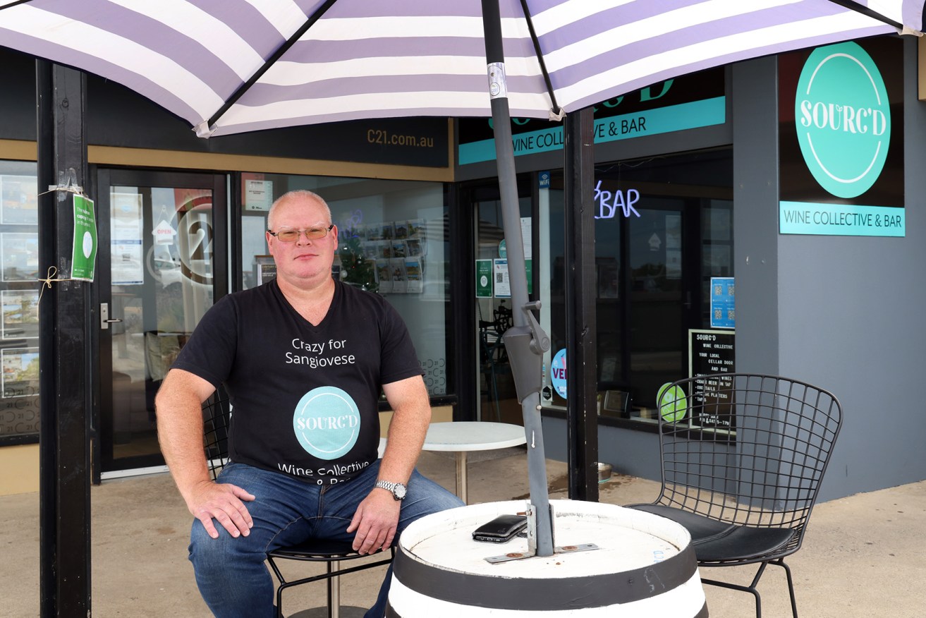 Sourc'd wine bar owner Matt Johnston is concerned he might be forced to check customers' vaccination certificates once SA reaches its 90 per cent vaccination target. Photo: Tony Lewis/InDaily  