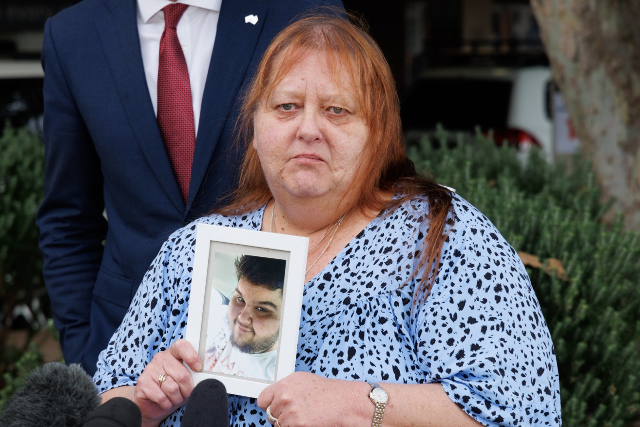 Michelle Viney holding a photo of her son Jayden Holberton. Photo: Tony Lewis/InDaily