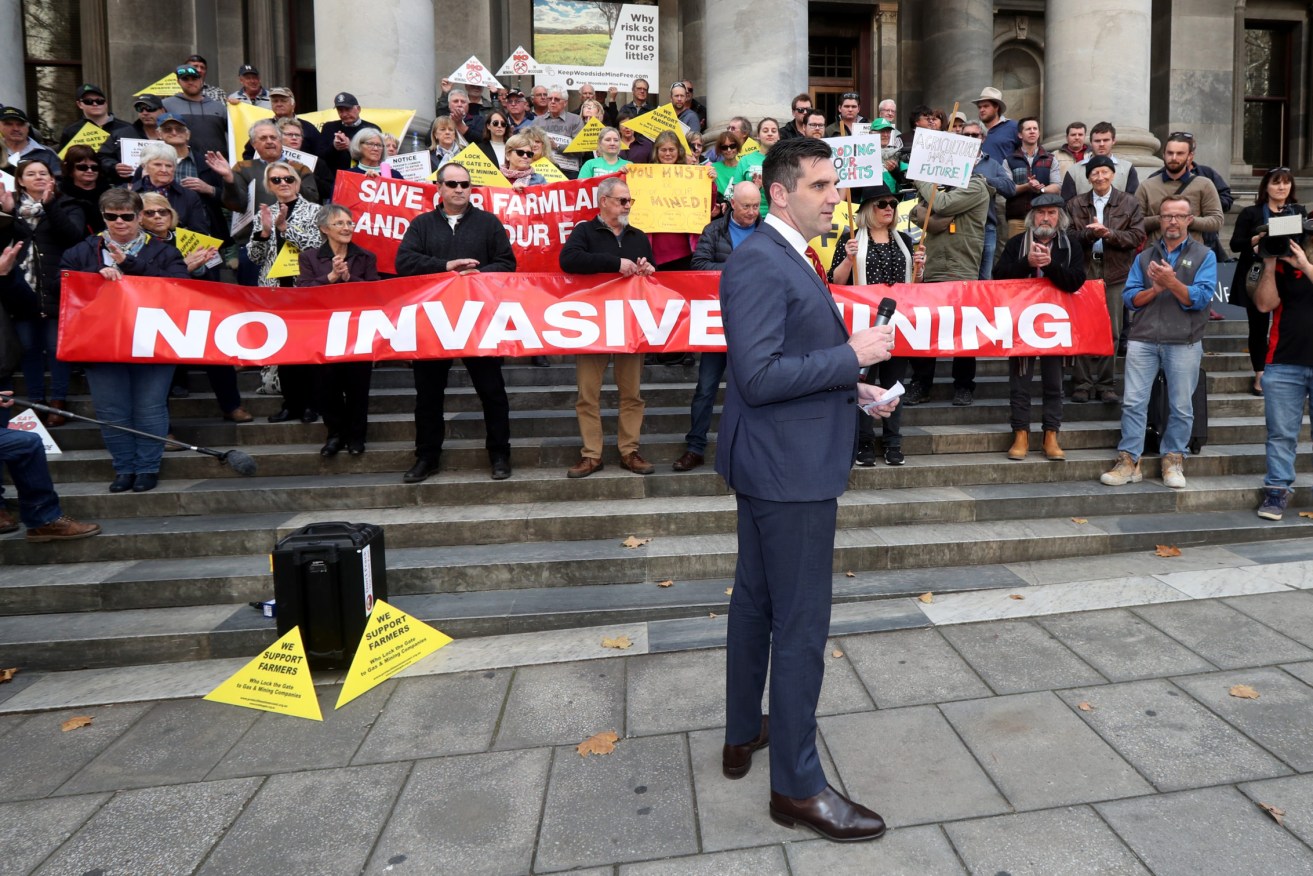 Fraser Ellis with supporters from the farming community outside parliament in 2019. Photo: Kelly Barnes / AAP