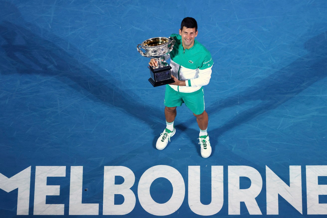 Serbia's Novak Djokovic is on track to defend his Australian Open title after winning a court battle in Melbourne yesterday. Picture: Hamish Blair/AP.