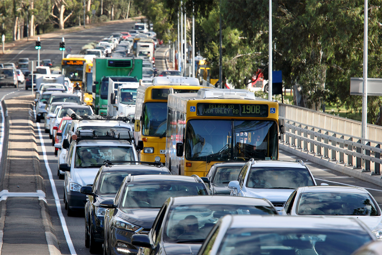 Buses trapped in a line of traffic on Morphett Street in the city. Photo: Tony Lewis/InDaily