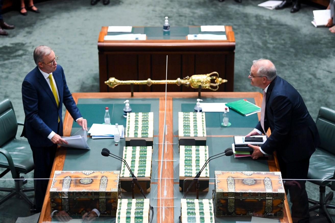 Prime Minister Scott Morrison (right) and Opposition Leader Anthony Albanese face off in Parliament yesterday. Photo: AAP/Lukas Coch