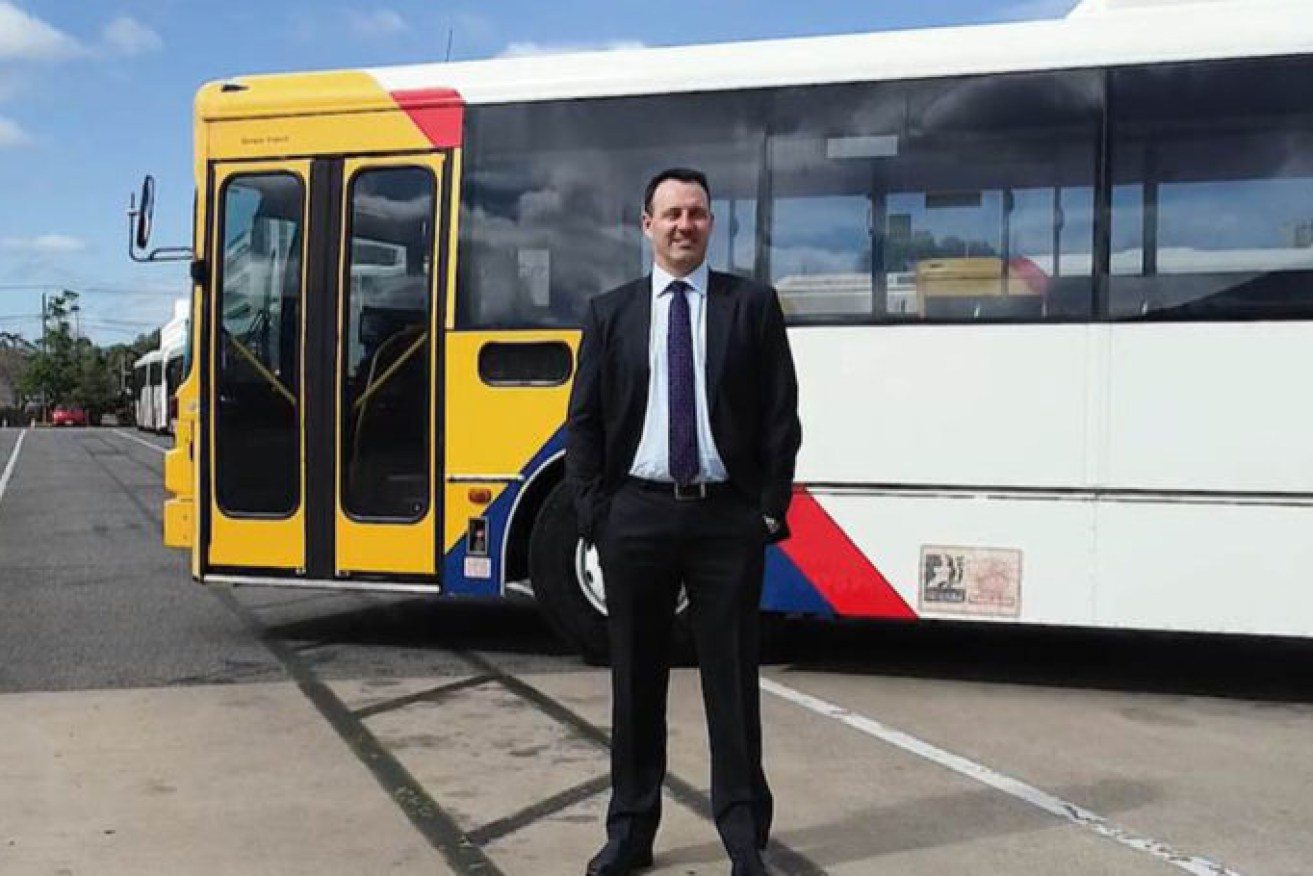 SeaLink Travel Group CEO Clint Feuerherdt with one of the company's Adelaide buses.