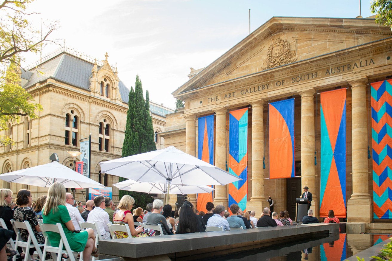 The opening of the 2022 Adelaide Biennial of Australian Art: Free/State at the Art Gallery of South Australia, with Kate Scardifield’s 'ALARUM' on the gallery facade. Photo: Nat Rogers