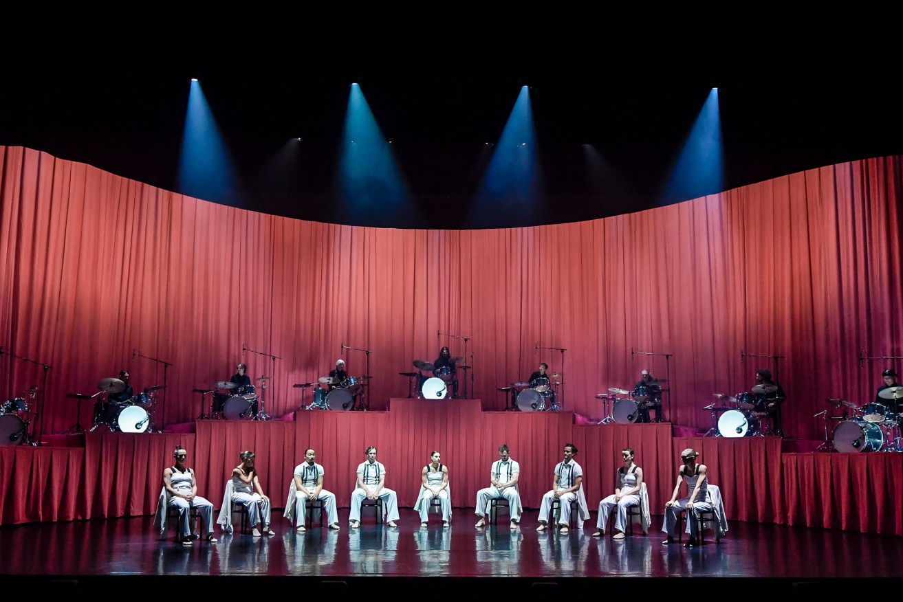 Stephanie Lake Company's 'Manifesto' in the Dunstan Playhouse – the show begins with the dancers poised beneath nine drummers on a rostrum above. Photo: Roy Vandervegt