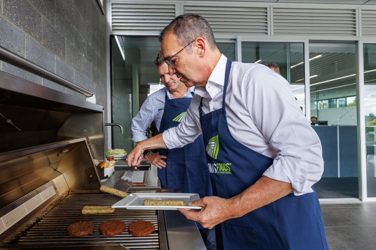 Premier Steven Marshall hit the barbie at Thomas Foods International this morning. Photo: Tony Lewis/InDaily 