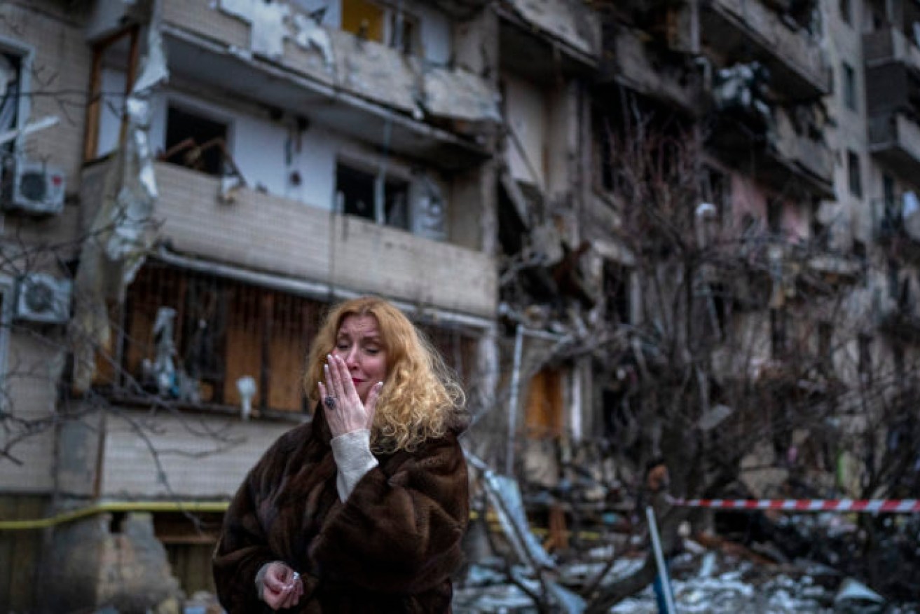 Natali Sevriukova after her apartment block was hit by Russian rockets in Kyiv. Photo: AP/Emilio Morenatti