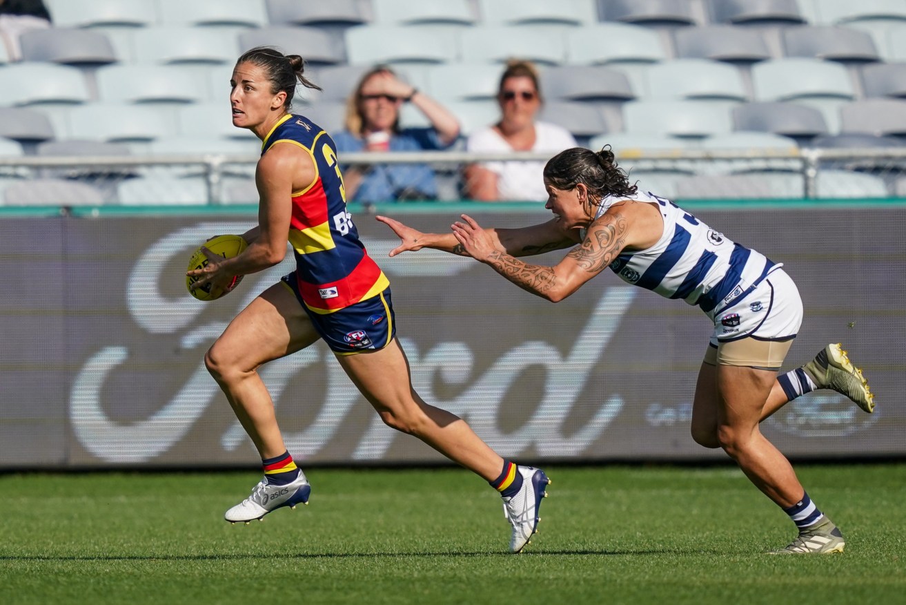 Ange Foley plays against Geelong. Photo: AAP/Natasha Morello